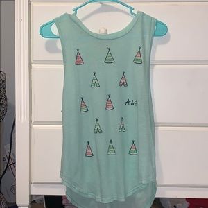 light blue top with colored tents on the front.